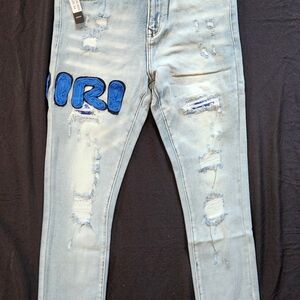 AMIRI Light Blue Distressed Skinny Jeans